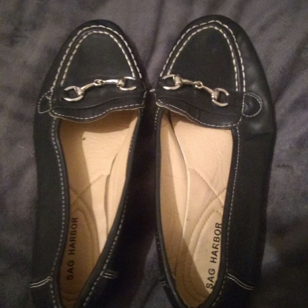 Black dress shoes with metal hooks